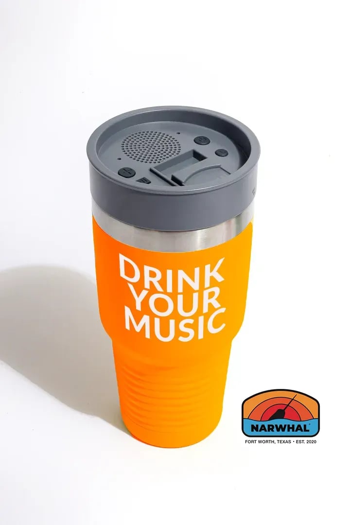 narwhal bluetooth speaker lid on tumbler that says drink your music