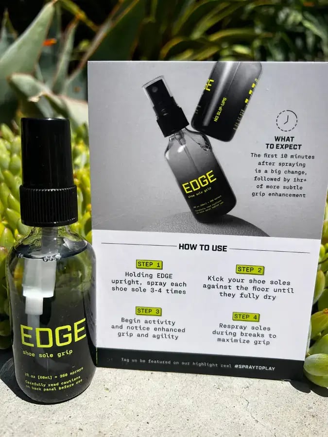 Bottle of EDGE sneaker grip spray next to a usage instruction card