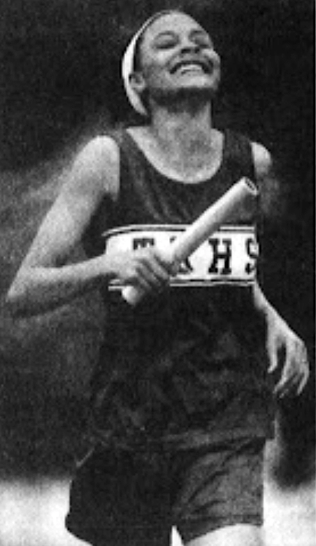 Kristi Matthews running track for her high school team in an undated black and white photo