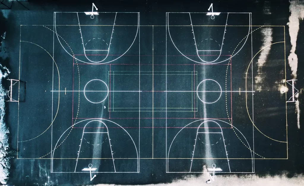 Overhead view of two basketball courts side by side
