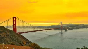 San Francisco Golden Gate Bridge with yellow sky background